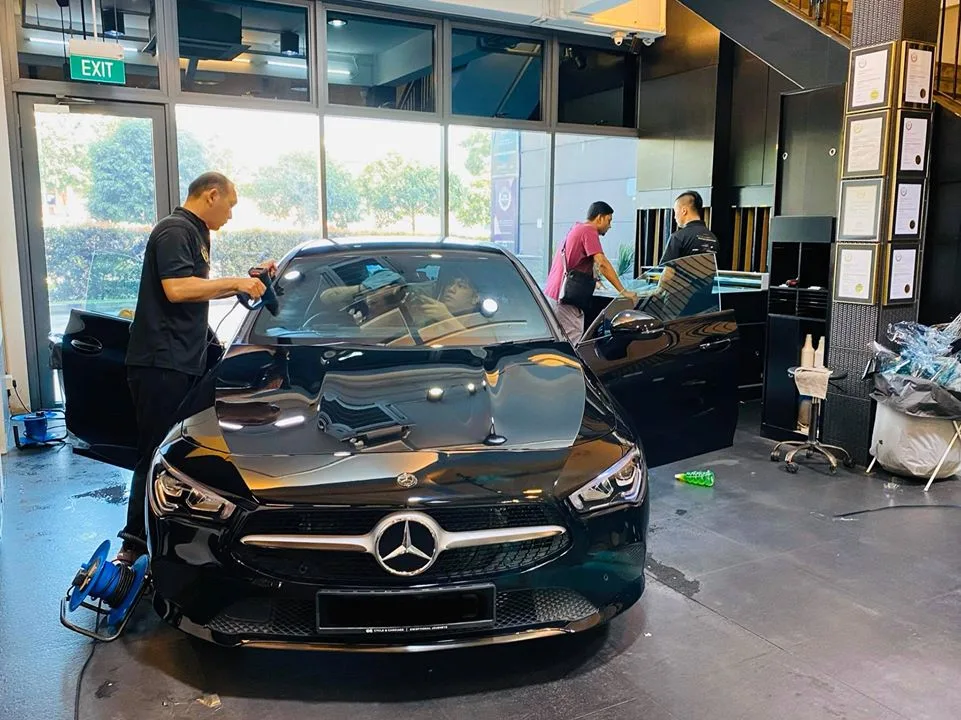 Black Mercedes-Benz CLA having its windscreen film fitted at Infratint Singapore