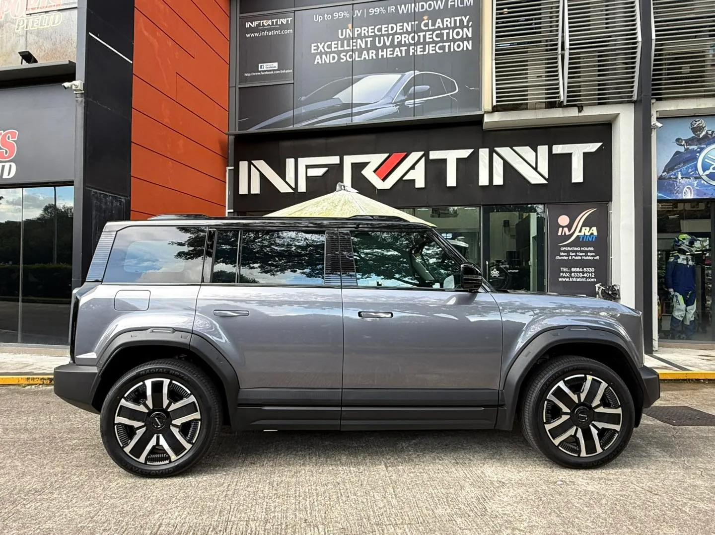 Grey Jaecoo J6 SUV side profile with tinted windows at Infratint Singapore