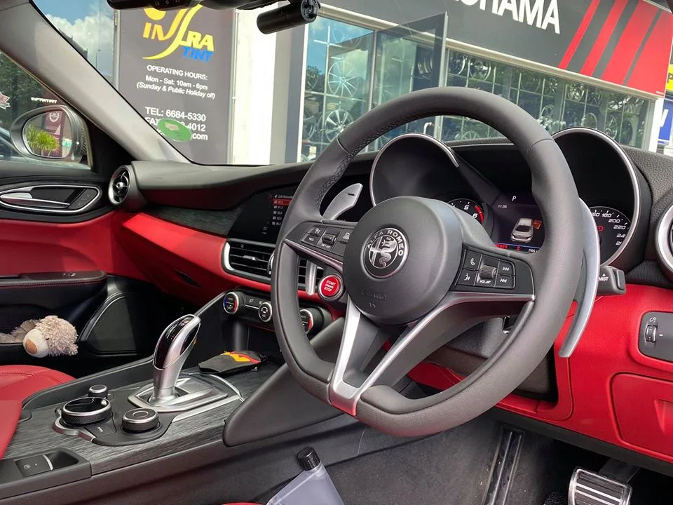 Alfa Romeo Giulia red leather interior and steering wheel at Infratint Singapore