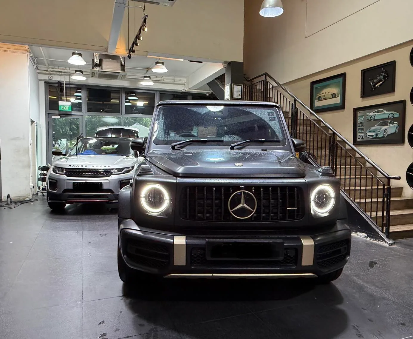 Matte grey Mercedes-Benz G-Wagon front view inside the Infratint workshop