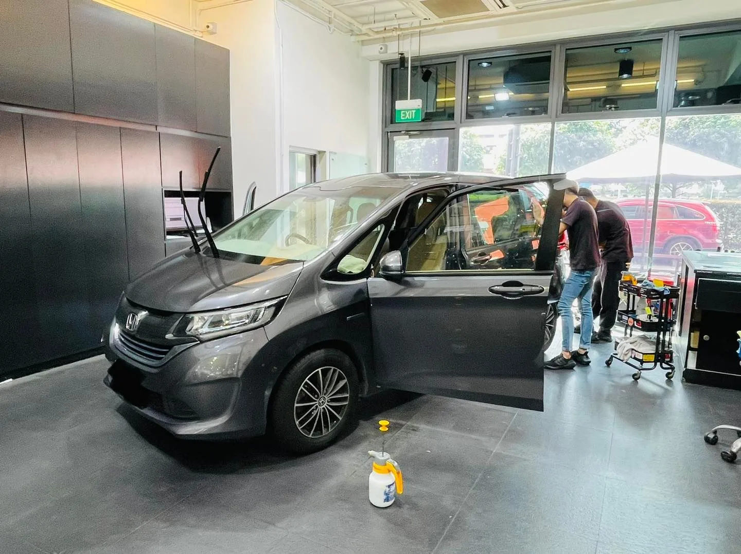 Grey Honda van having window film fitted at Infratint Singapore