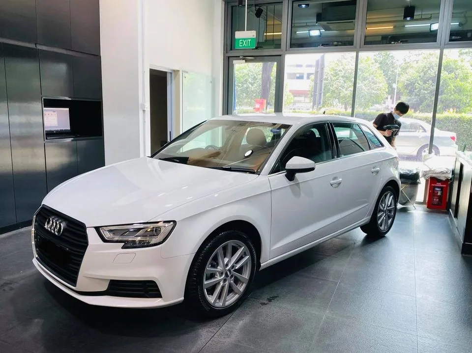 White Audi A3 Sportback parked in the showroom at Infratint Singapore