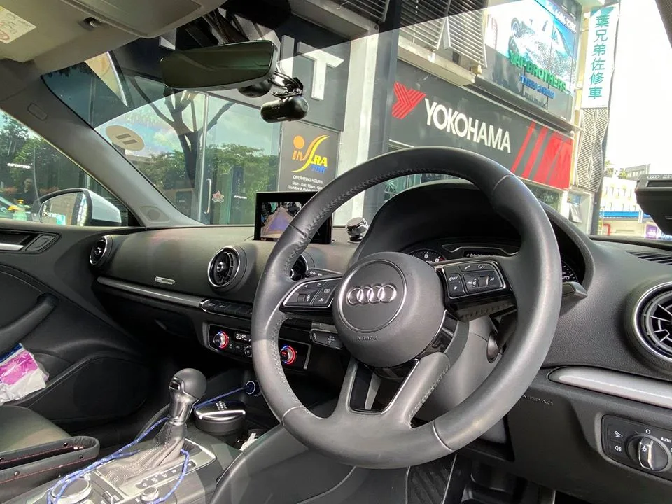 Interior of an Audi looking through the tinted windscreen at Infratint Singapore