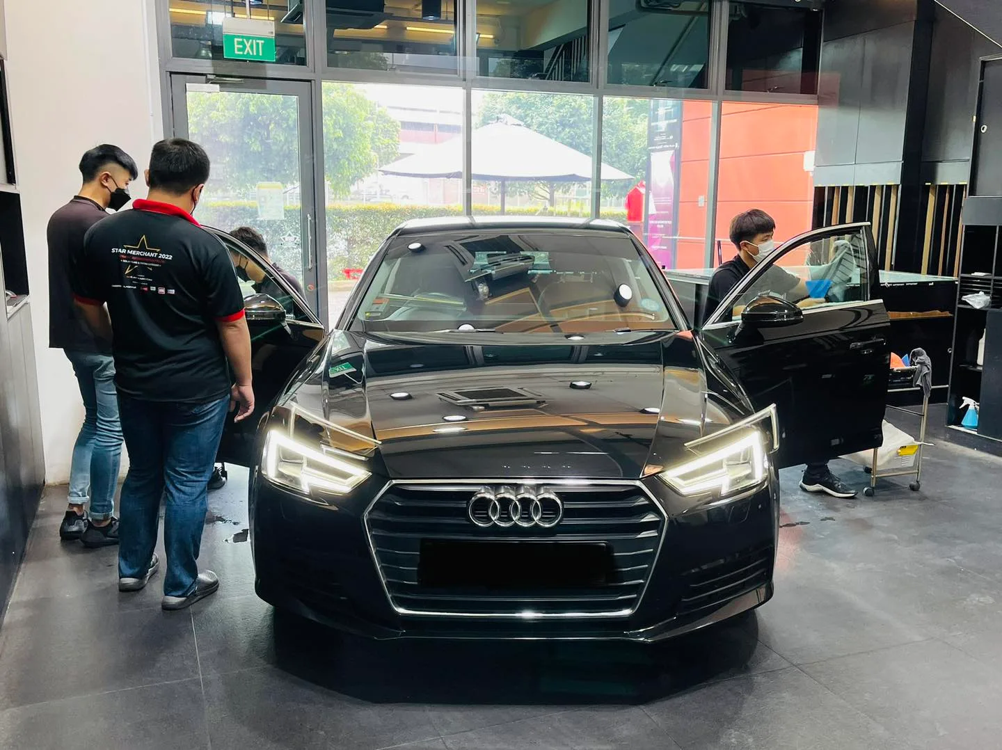 Black Audi A4 having window film installed at Infratint Singapore