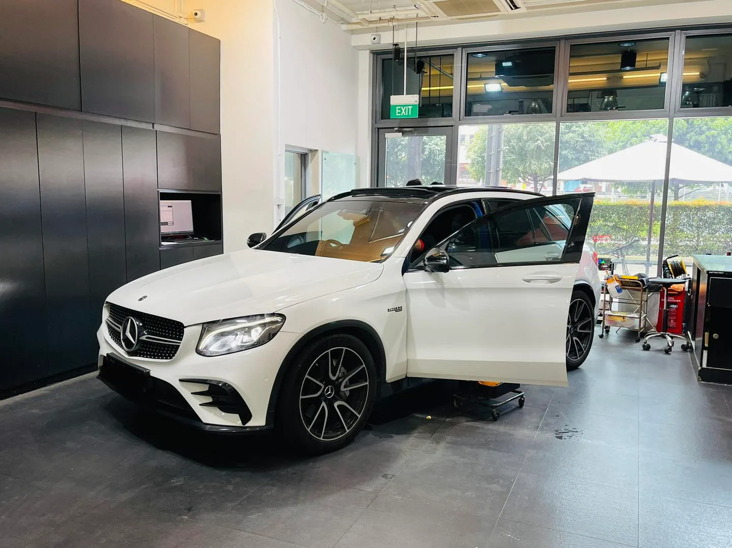White Mercedes-AMG GLC front three-quarter view at Infratint Singapore window tinting
