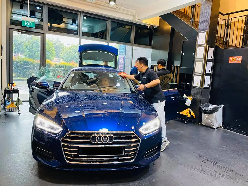 Deep blue Audi Sportback having solar film fitted at Infratint Singapore