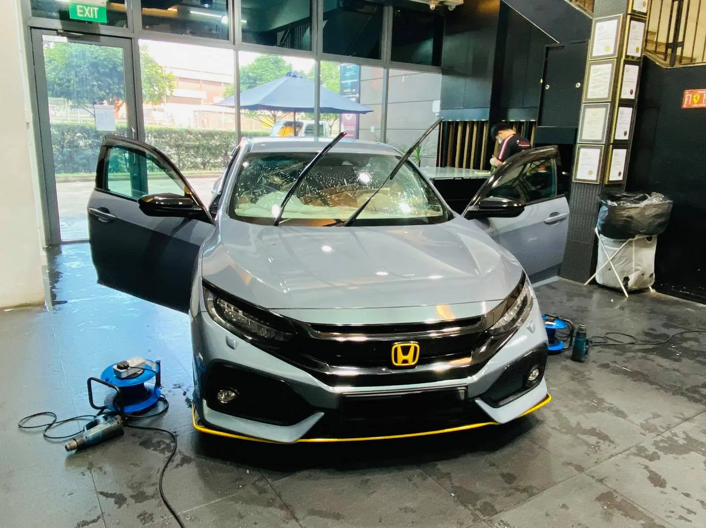 Grey Honda Civic hatchback front view with doors open at Infratint Singapore