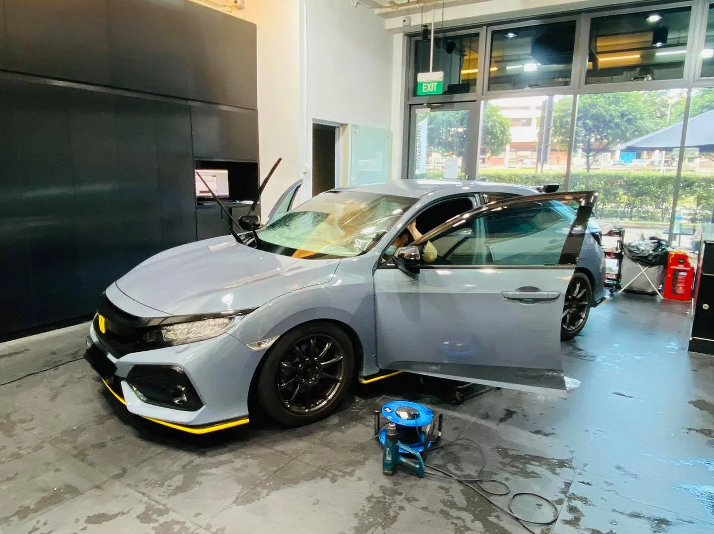 Grey Honda Civic hatchback side profile with spoiler at Infratint Singapore window tinting