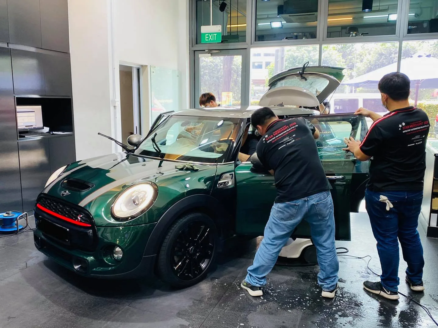 Green Mini Cooper S during tinting at Infratint Singapore