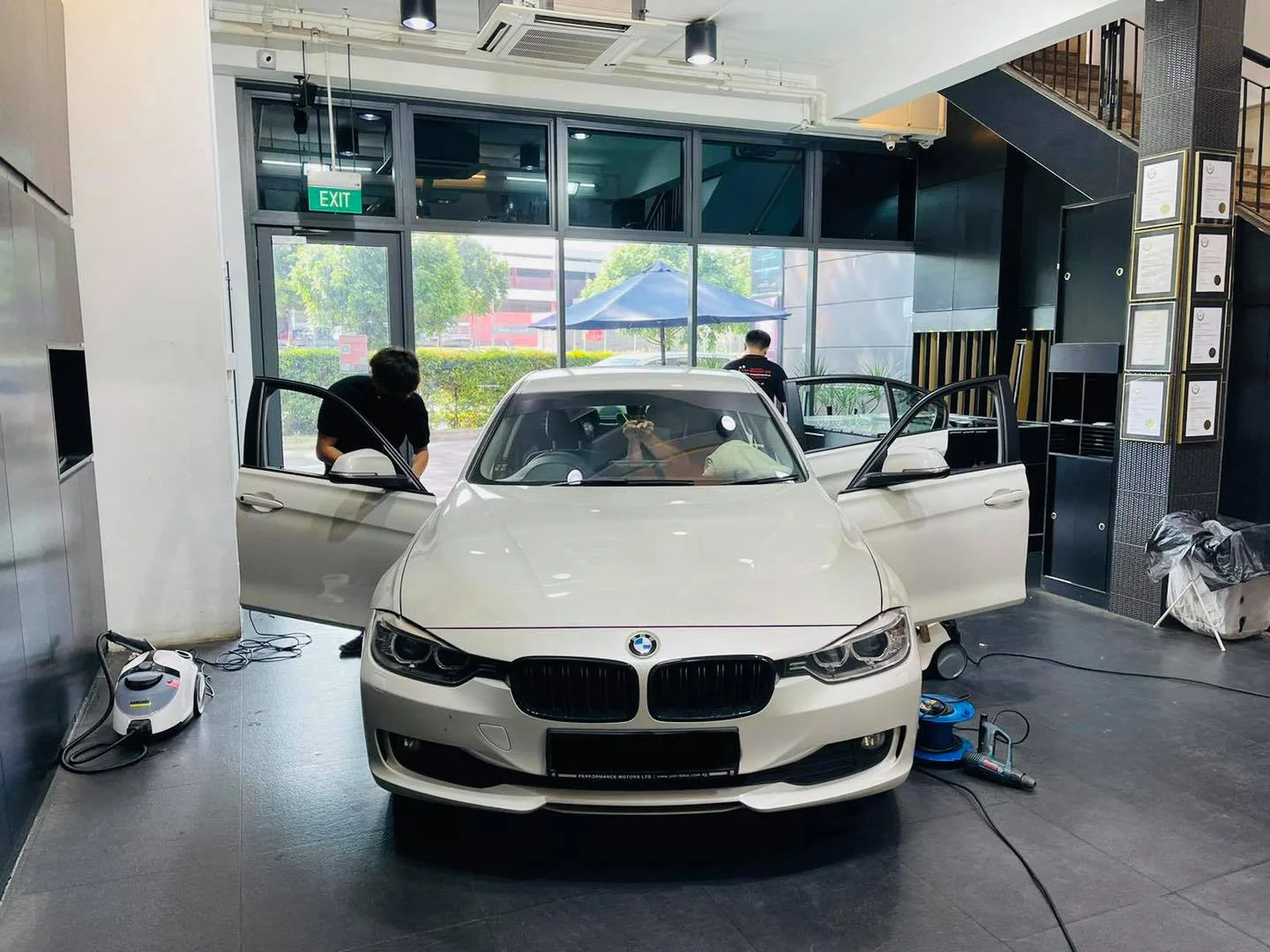 White BMW 3 Series front view with doors open at Infratint Singapore