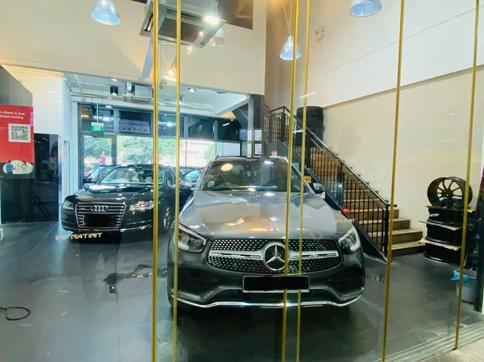 Grey Mercedes-Benz GLC and black Audi A8 at Infratint Singapore for window film