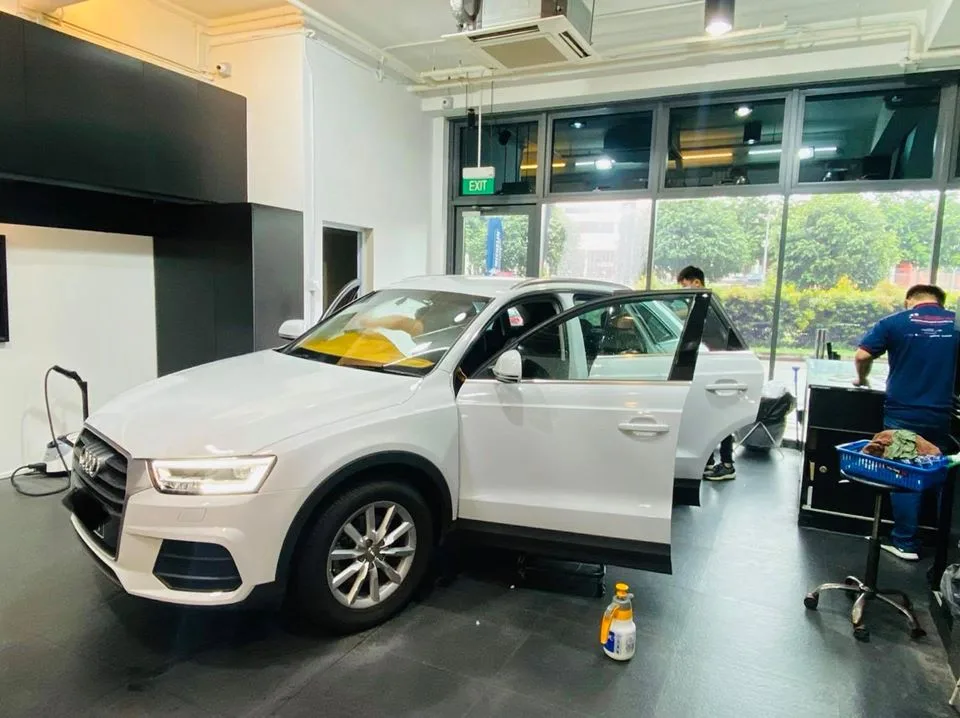 White Audi Q3 having window film fitted at Infratint Singapore