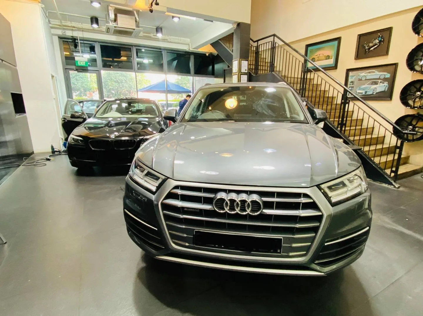 Grey Audi Q5 SUV front view at Infratint Singapore for window film