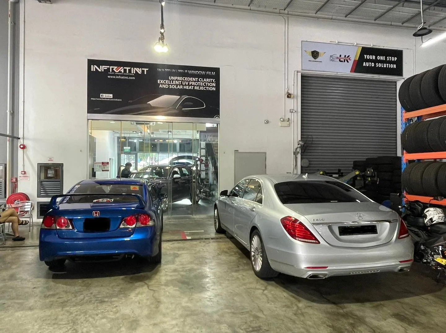 Blue Honda Civic and silver Mercedes-Benz S-Class at Infratint Singapore
