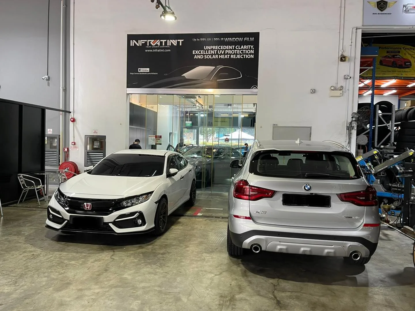 White Honda Civic and white BMW SUV lined up at Infratint Singapore