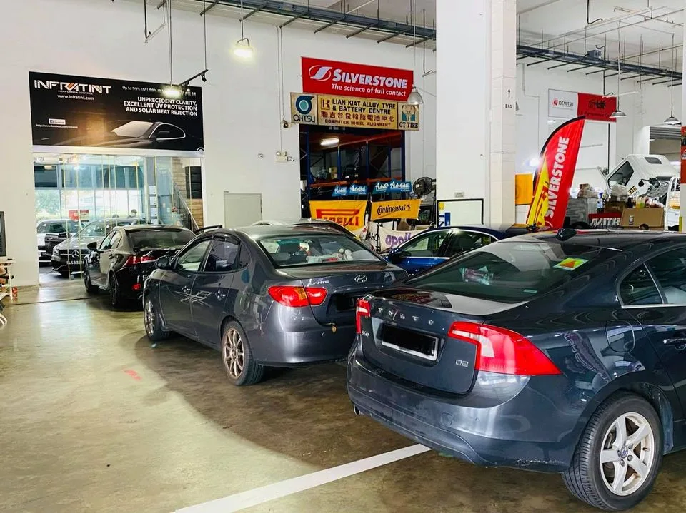 Grey Hyundai Elantra and Volvo S60 lined up for window tinting at Infratint Singapore