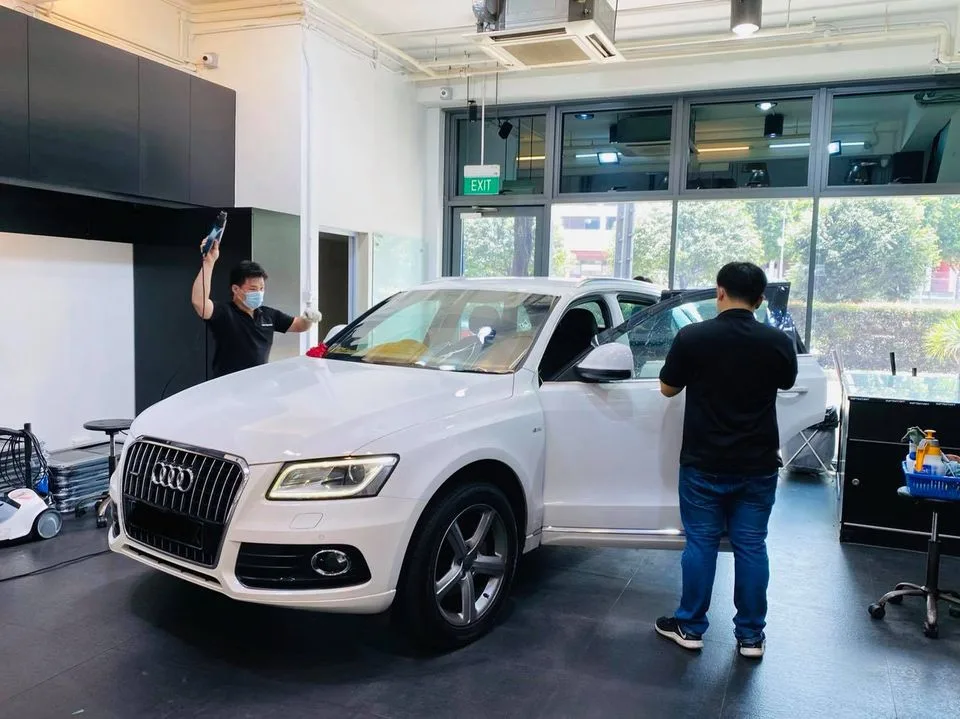 White Audi Q5 SUV having its side windows tinted at Infratint Singapore
