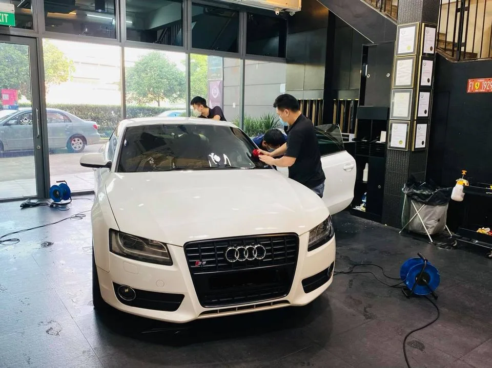 White Audi S5 being tinted by the team at Infratint Singapore