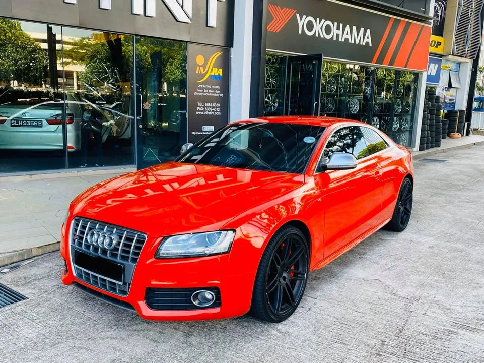 Red Audi S5 coupe front three-quarter view at Infratint Singapore