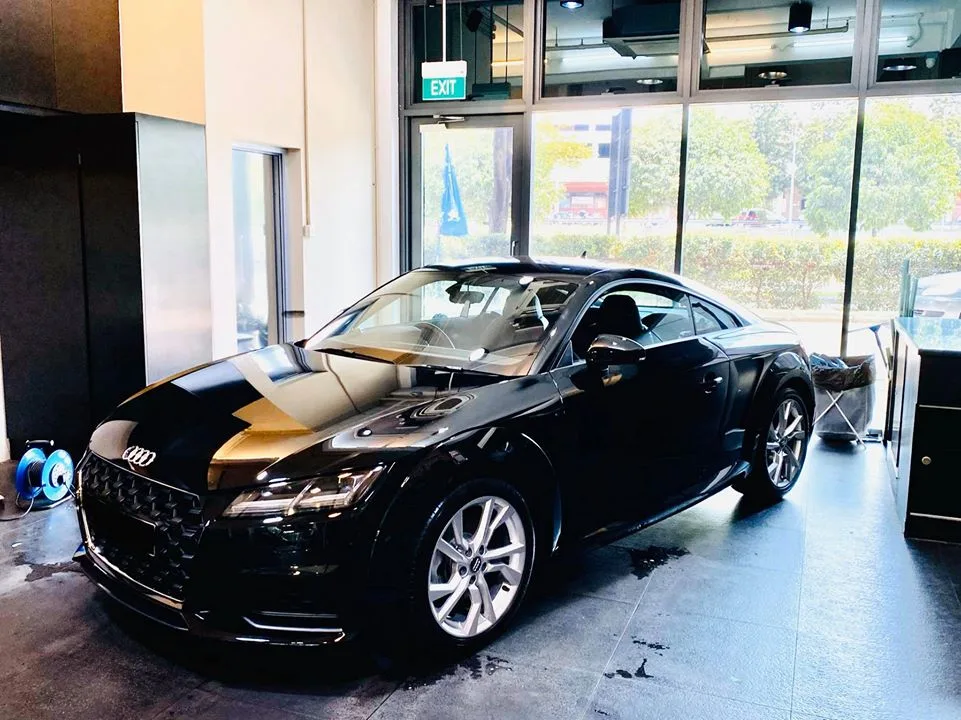 Black Audi TT coupe in front three-quarter view at Infratint Singapore