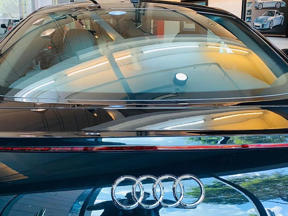 Tinted rear glass and bootlid of a black Audi TT at Infratint Singapore
