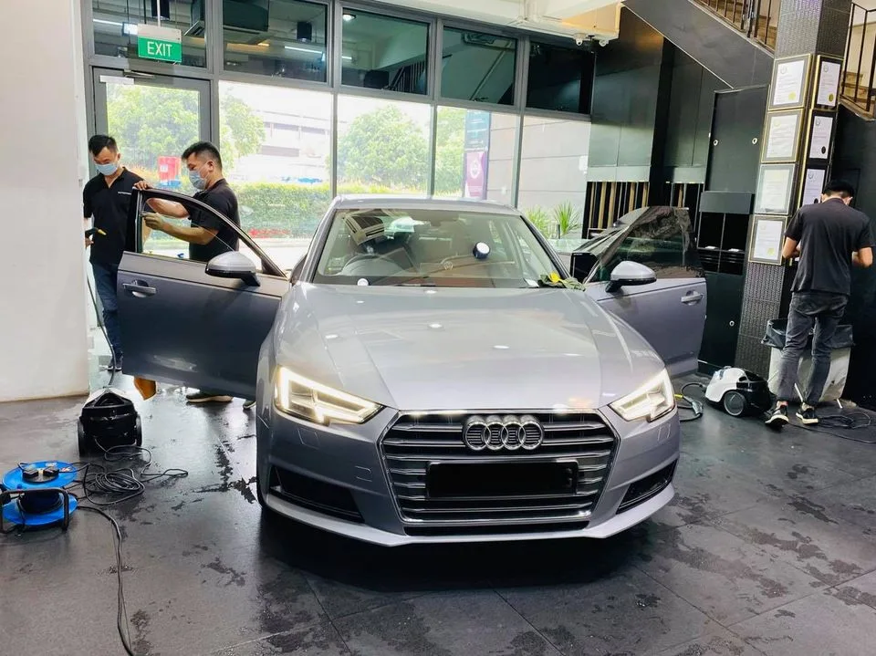 Silver Audi A4 having window film installed at Infratint Singapore