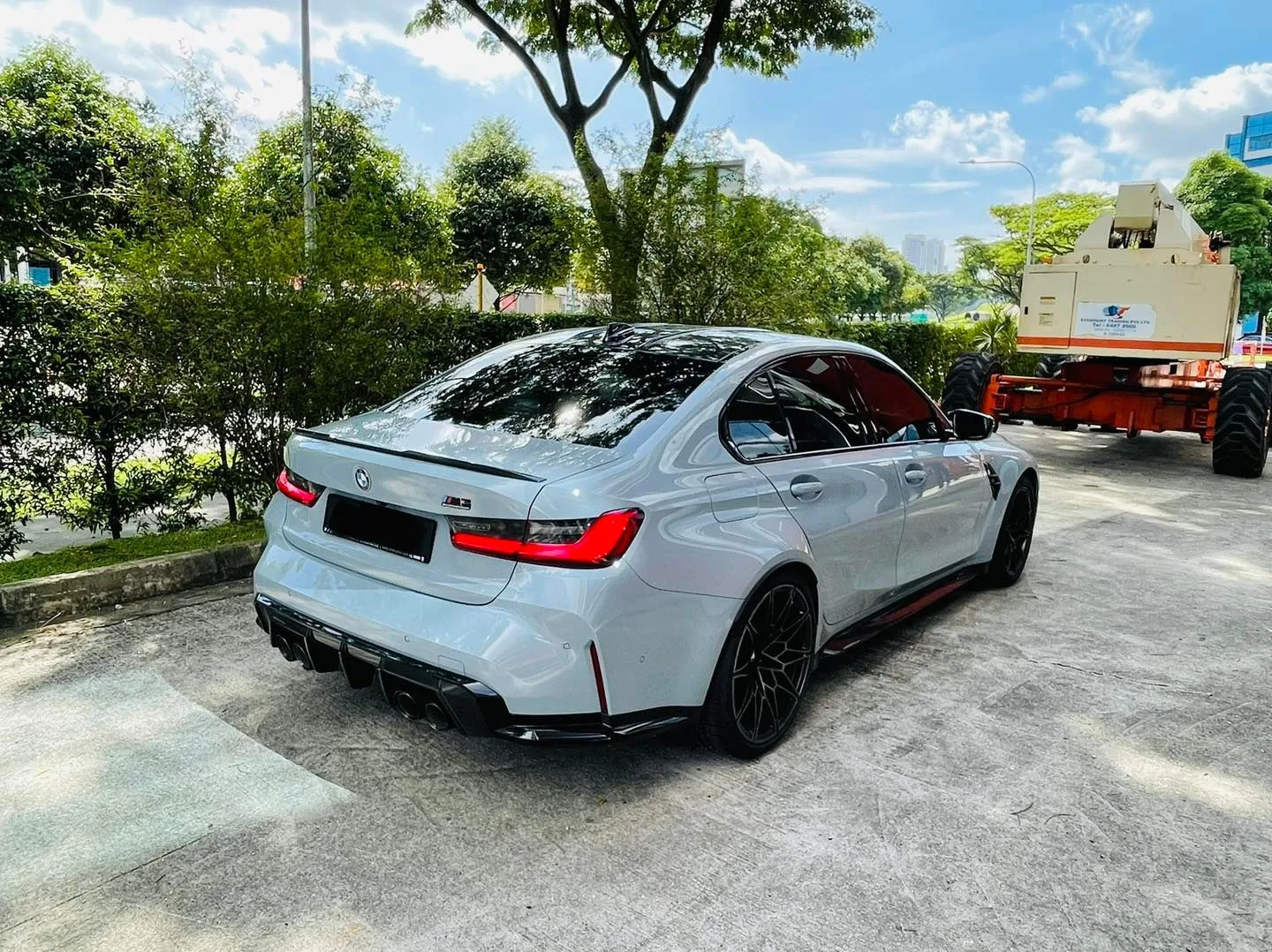Grey BMW M3 rear three-quarter with tinted windows at Infratint Singapore