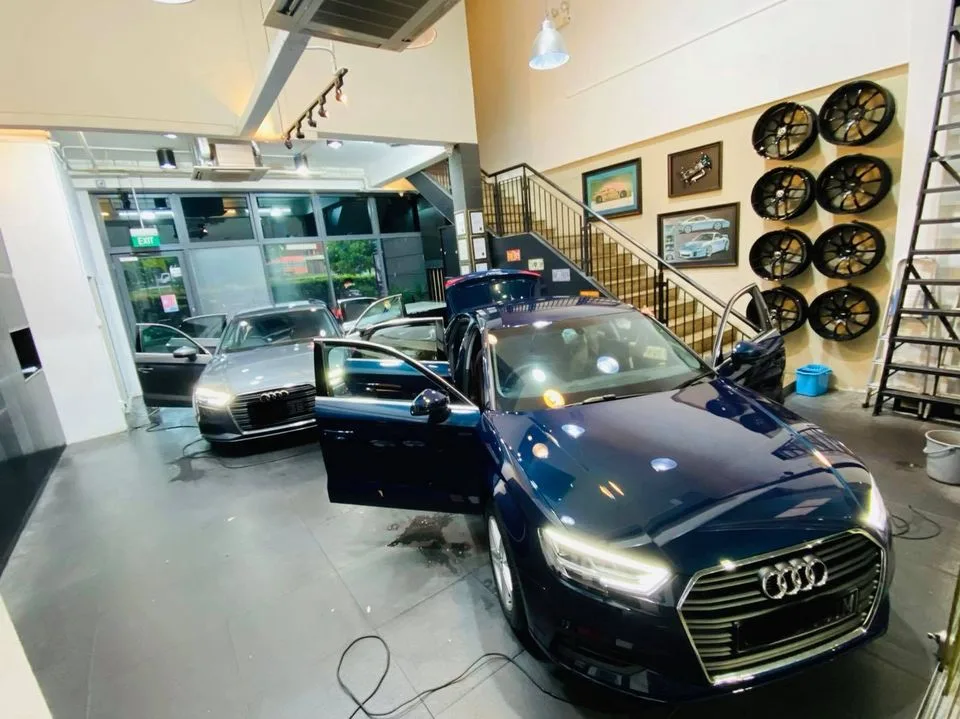 Dark blue Audi sedan being tinted at Infratint Singapore