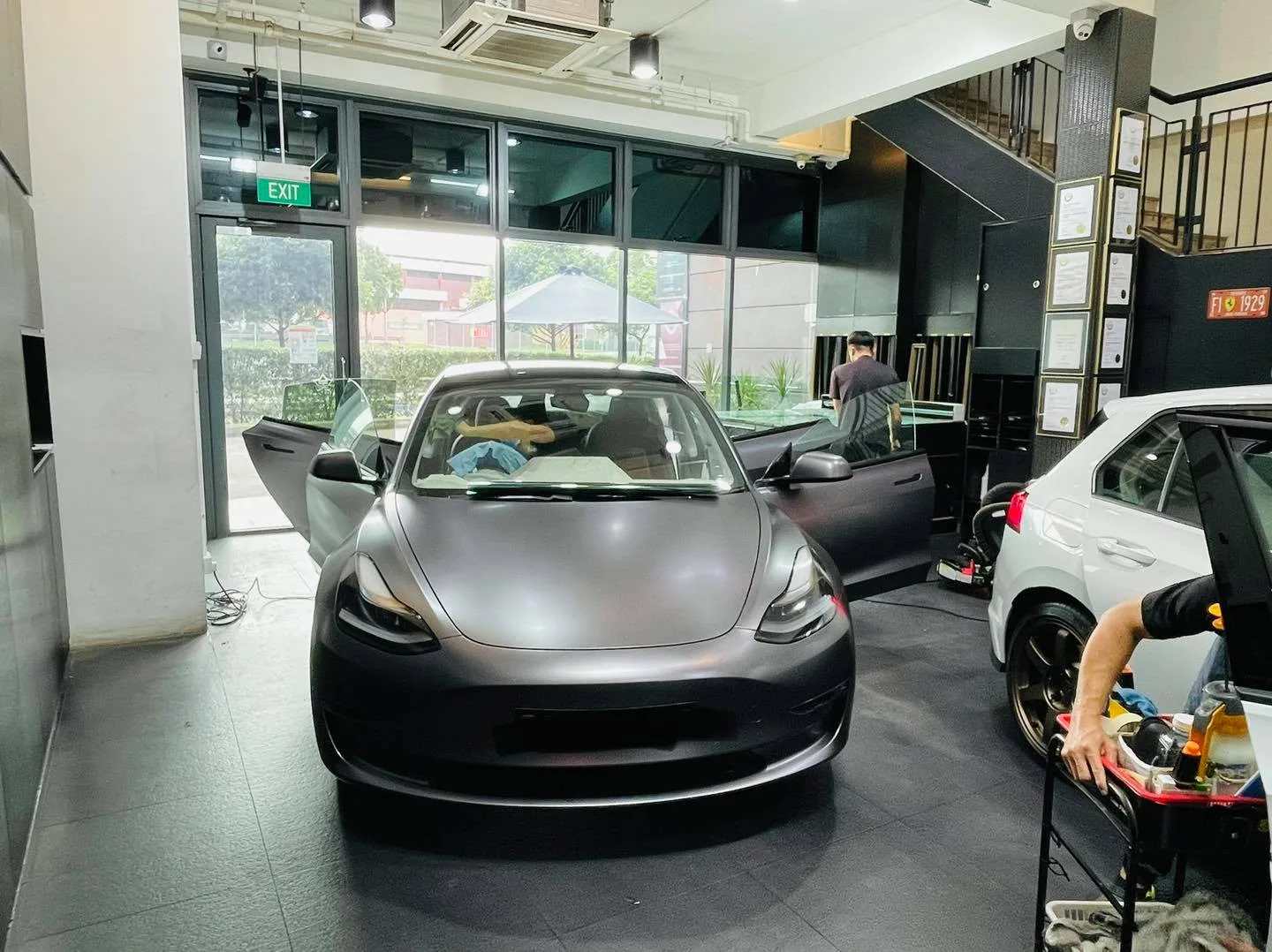 Satin grey Tesla Model 3 having its windows tinted at Infratint Singapore