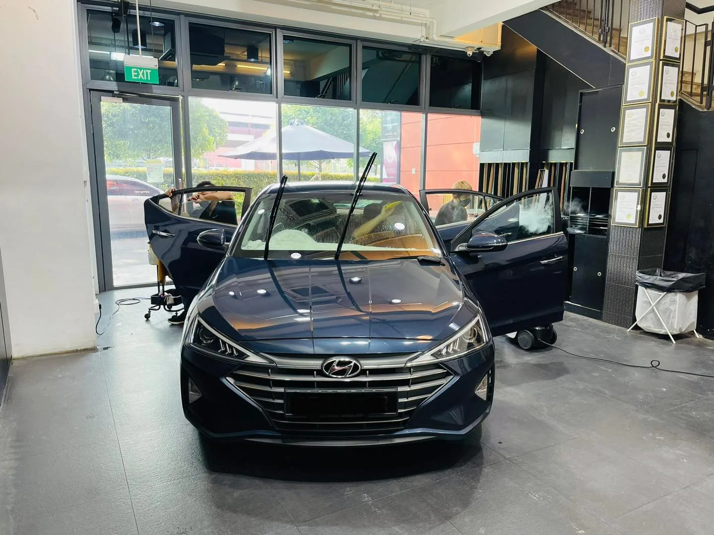 Dark blue Hyundai Avante sedan front view at Infratint Singapore