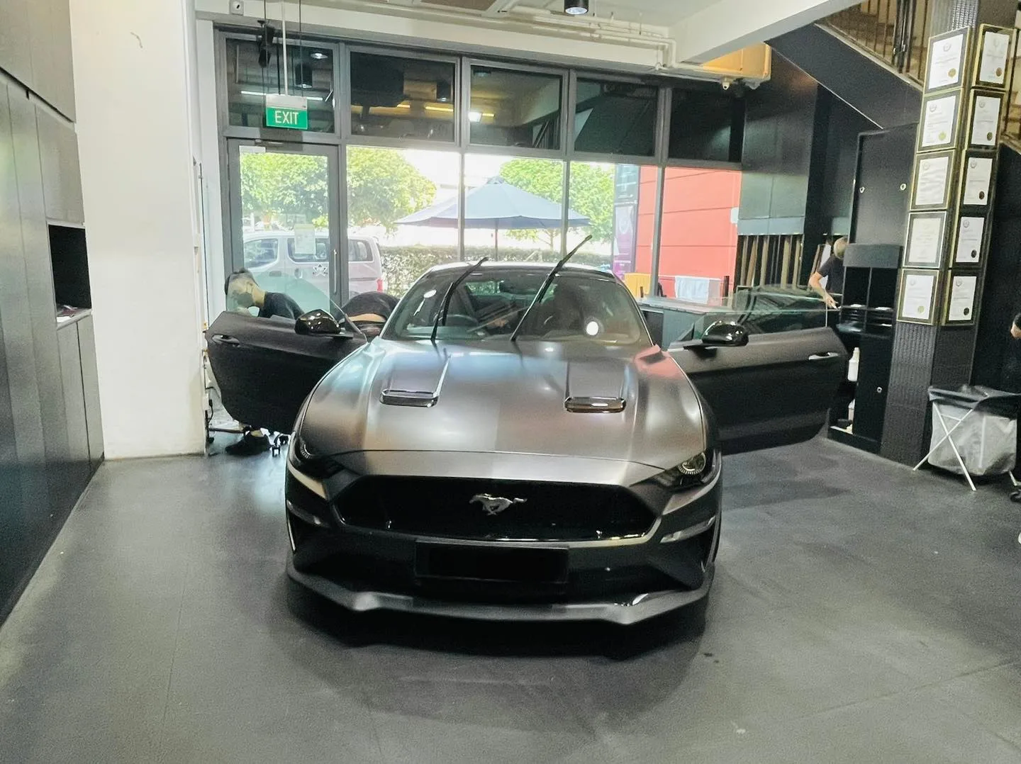 Grey Ford Mustang viewed head-on inside Infratint Singapore