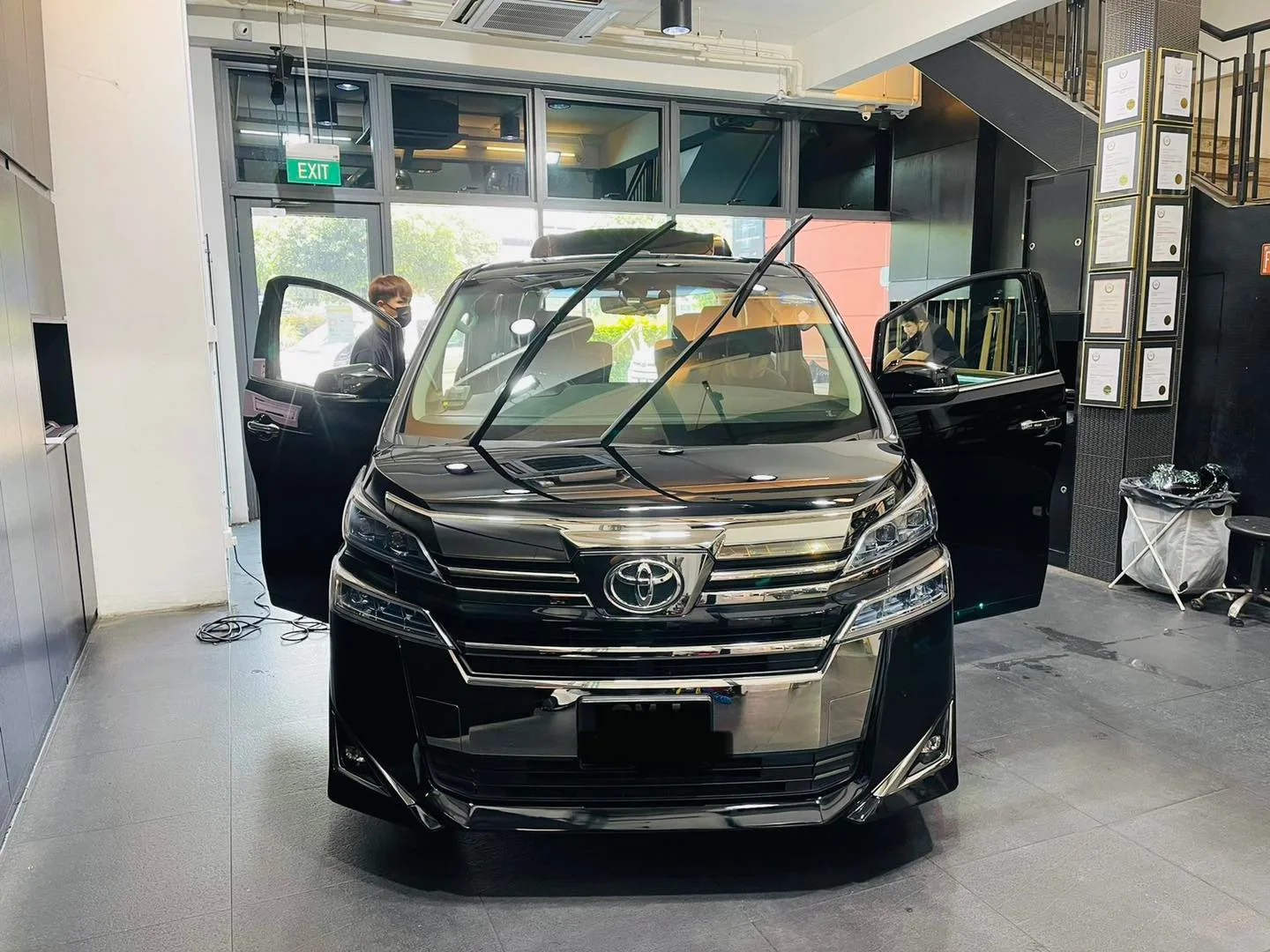 Black Toyota Vellfire MPV front view at Infratint Singapore