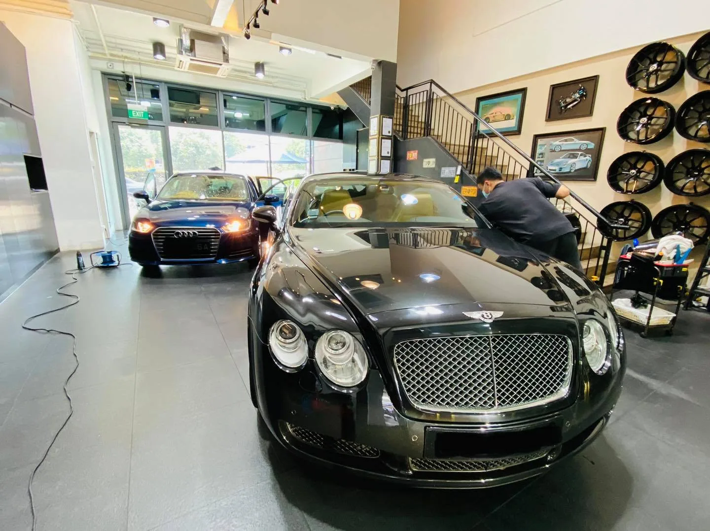 Black Bentley Continental GT and a black Audi at Infratint Singapore for window film