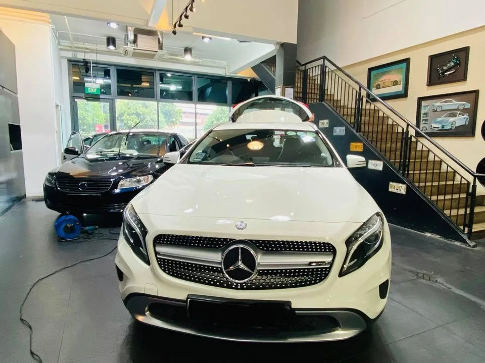 White Mercedes-Benz GLA SUV viewed head-on at Infratint Singapore