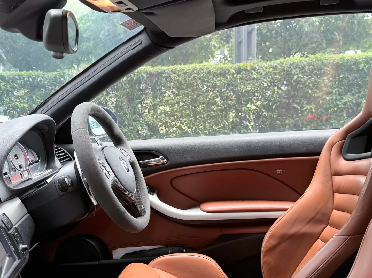 BMW E46 M3 cognac leather interior seen through tinted glass at Infratint Singapore