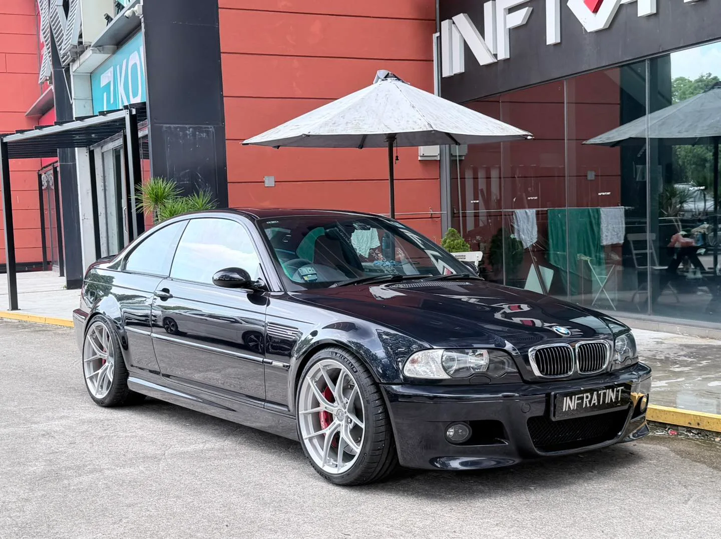 Tinted black BMW E46 M3 front three-quarter view at Infratint Singapore