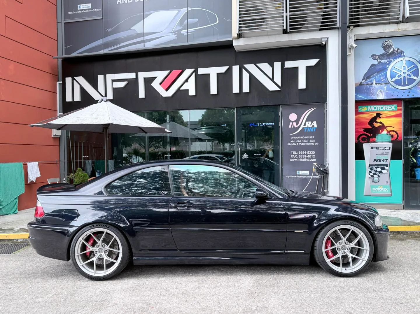 Tinted black BMW E46 M3 side profile outside Infratint Singapore