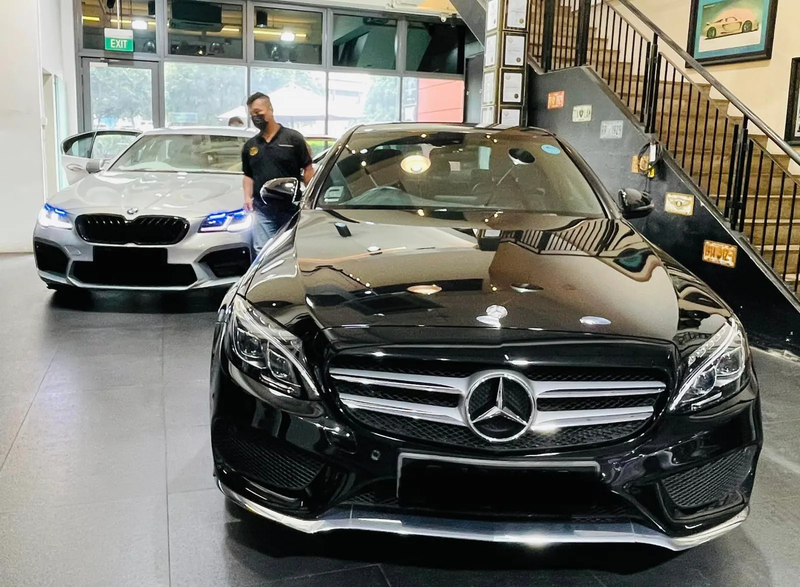 Black Mercedes-Benz C-Class and silver BMW at Infratint Singapore for window film