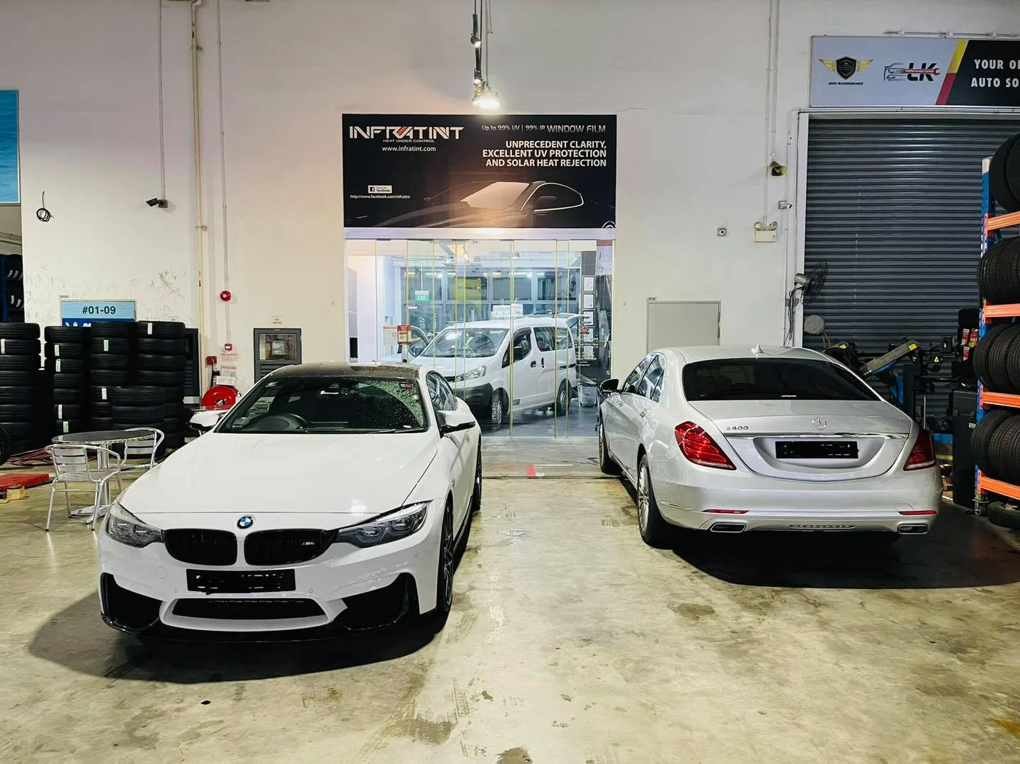 White BMW M coupe and white Mercedes-Benz sedan at Infratint Singapore