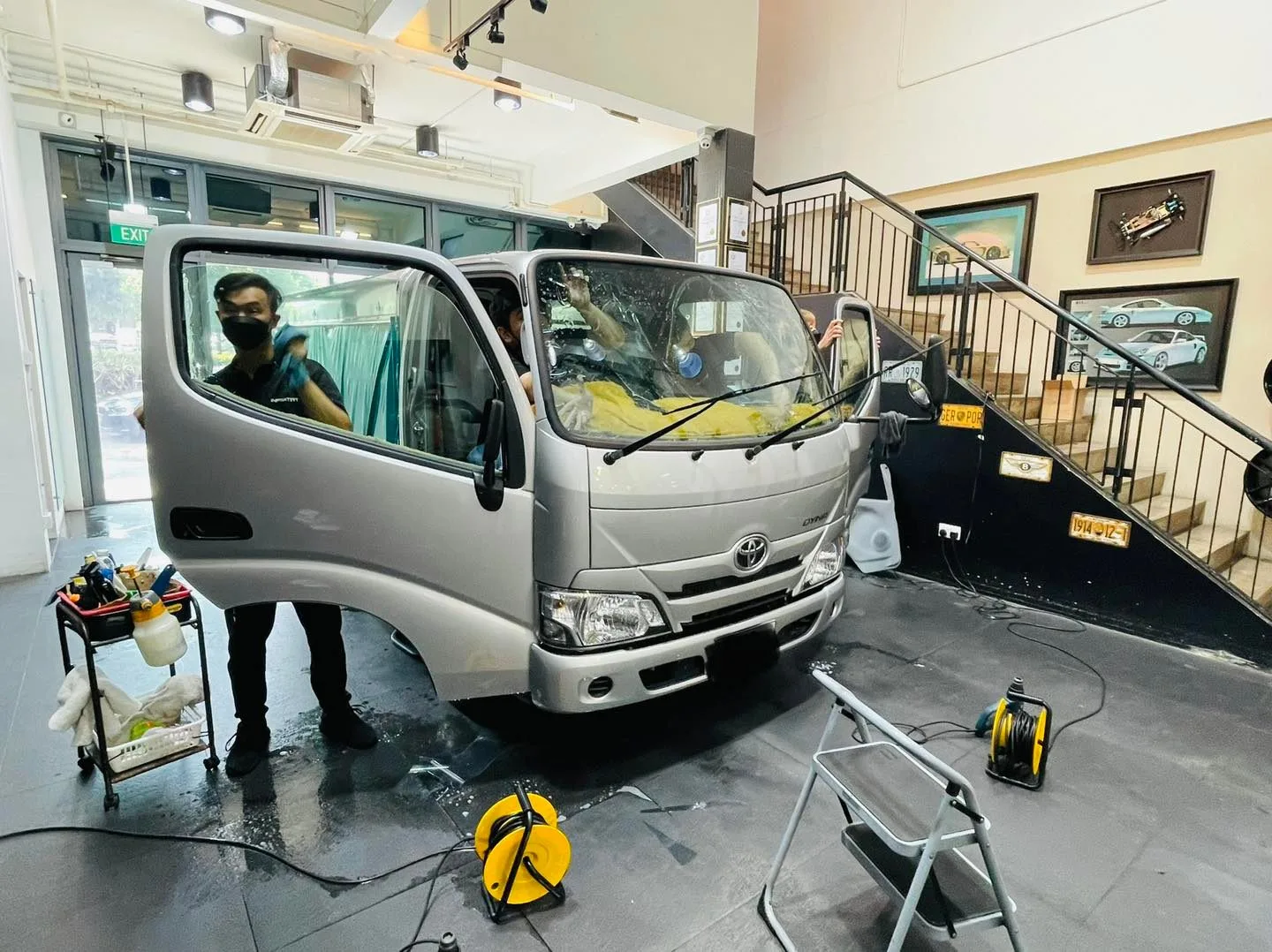 Silver Toyota light truck having its cab windows tinted at Infratint Singapore