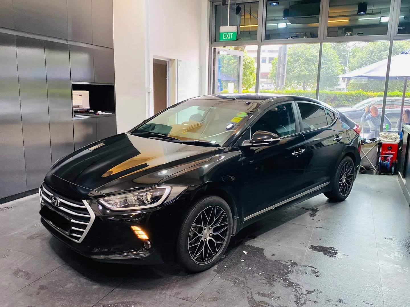 Black Hyundai Elantra with tinted windows at Infratint Singapore