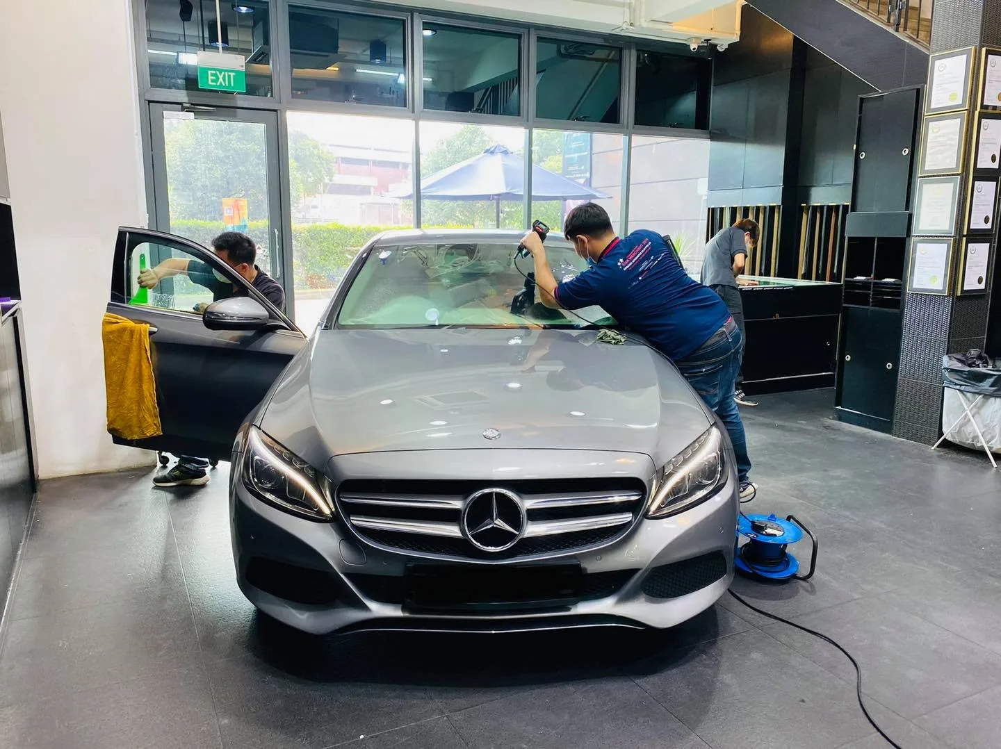 Grey Mercedes-Benz C-Class having its windscreen filmed at Infratint Singapore