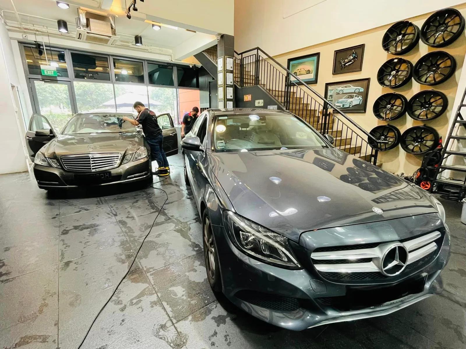 Grey Mercedes-Benz C-Class being tinted beside another Mercedes sedan at Infratint Singapore