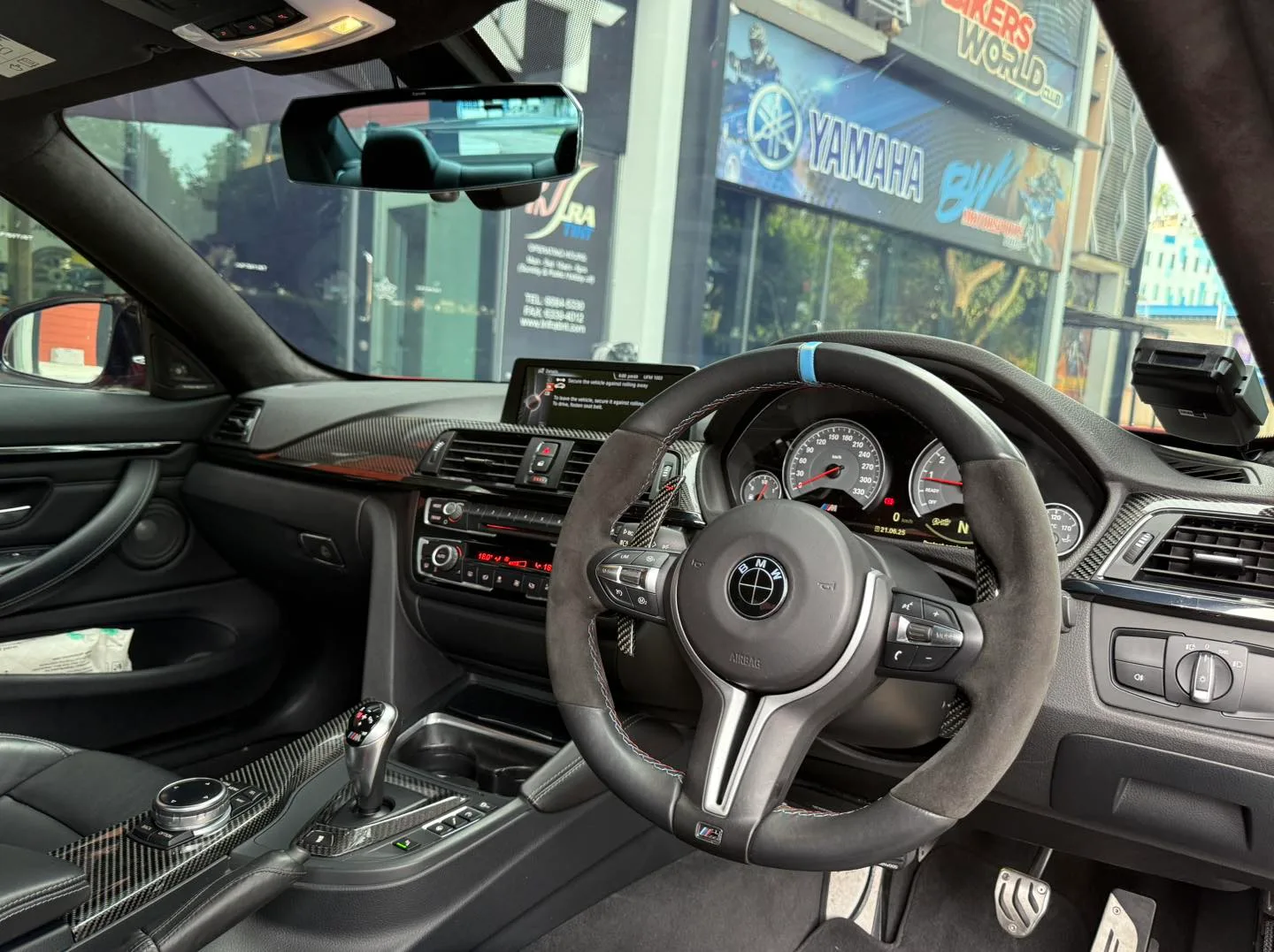BMW M4 Alcantara steering wheel and carbon interior at Infratint Singapore