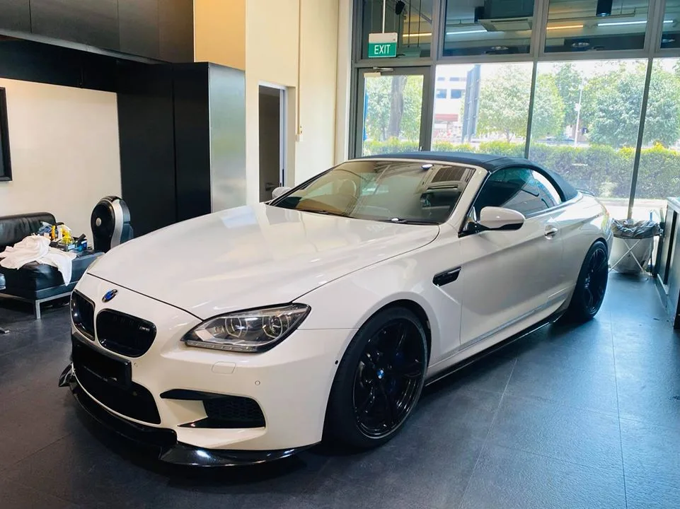 White BMW M6 convertible front three-quarter at Infratint Singapore