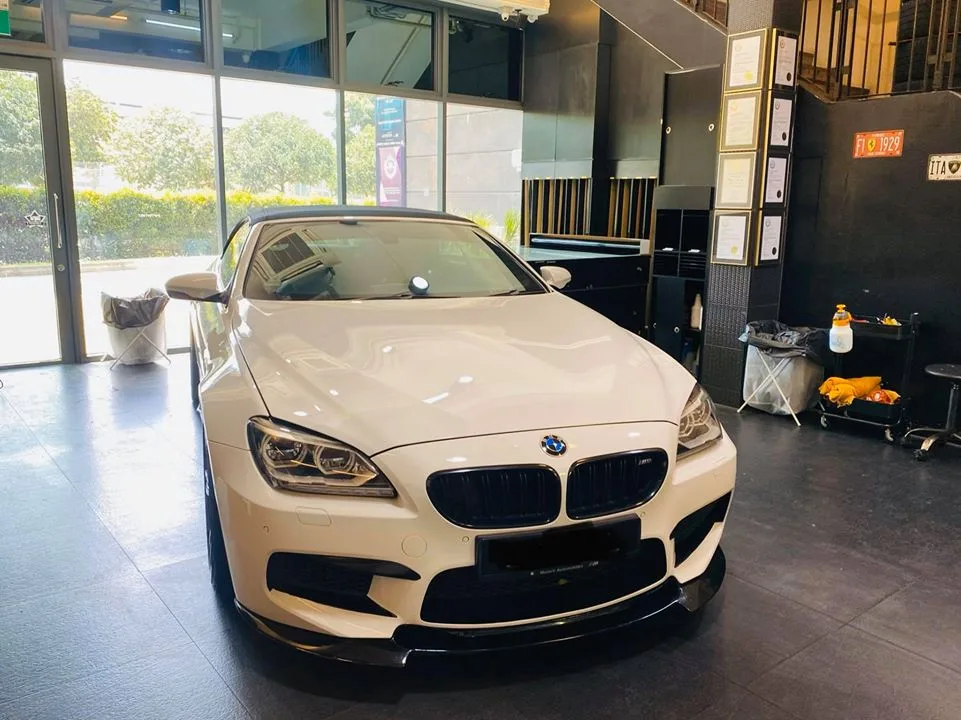 White BMW M6 front view inside Infratint Singapore