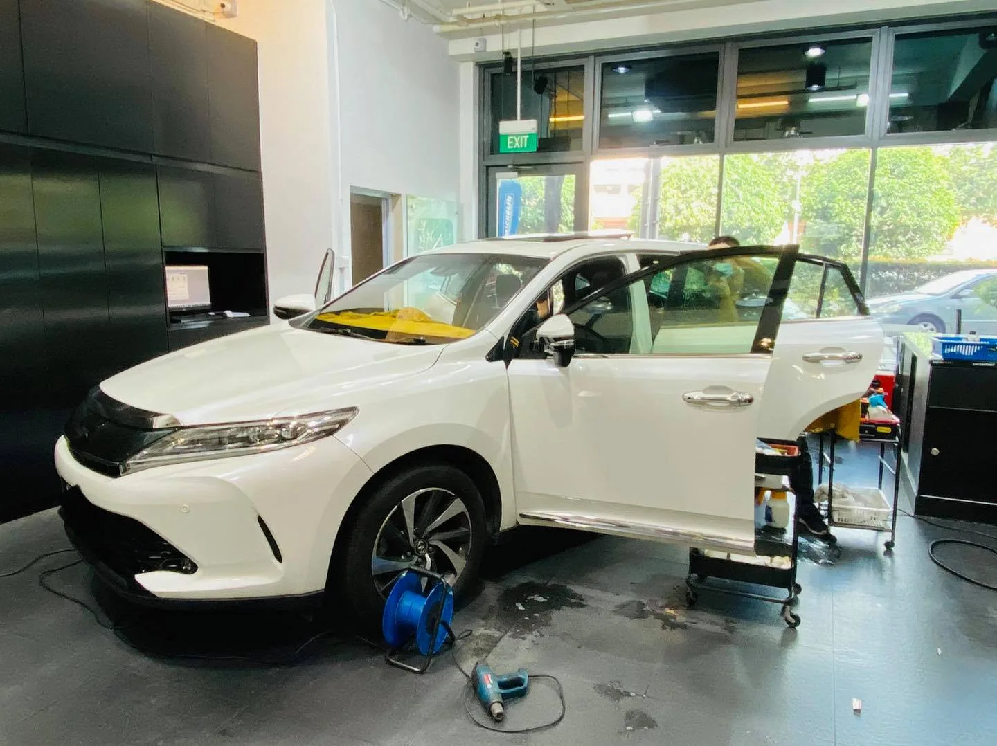 White Toyota SUV having its windows tinted at Infratint Singapore