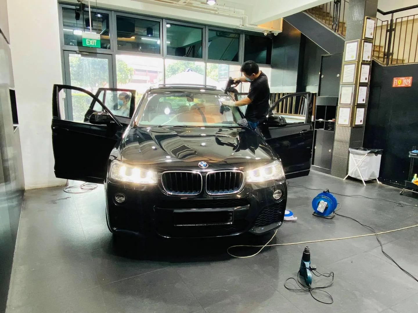 Black BMW X3 having window film fitted at Infratint Singapore