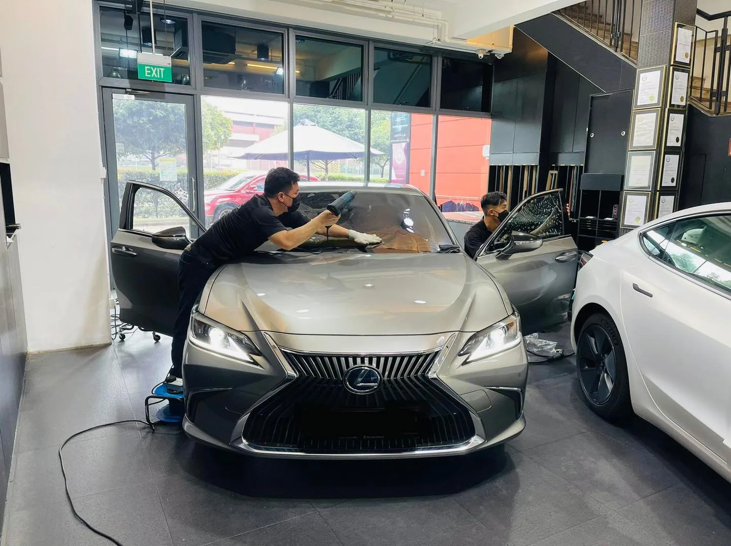 Grey Lexus ES sedan having its windscreen tinted at Infratint Singapore