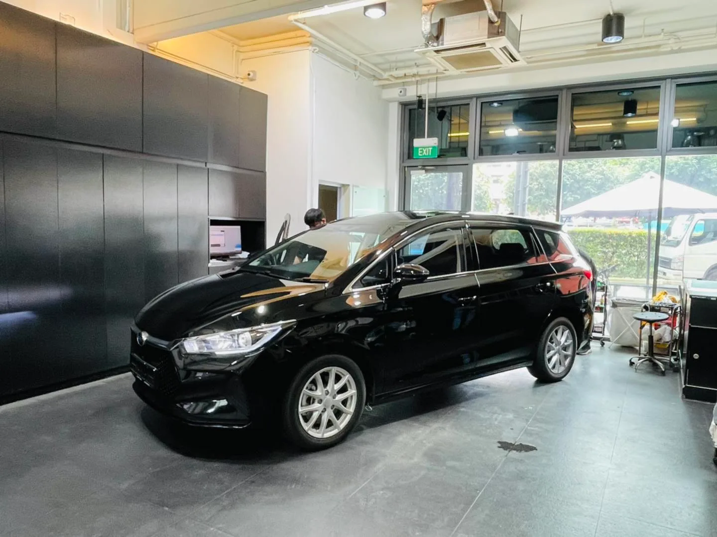 Black estate wagon having windows tinted at Infratint Singapore